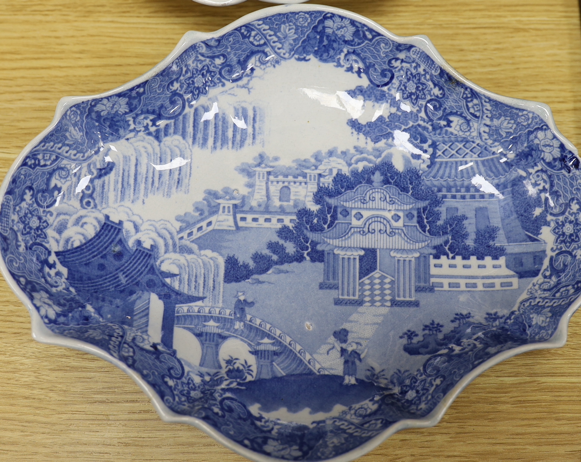 Two early 19th century pearlware lozenge dishes, a Royal Worcester dish and two Wedgwood jars and covers, blue and white dish 27.5cm wide